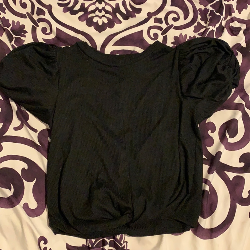 Size small black shirt.